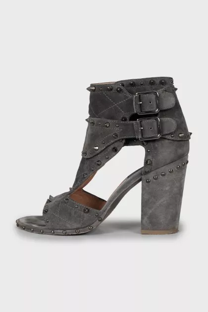Grey suede ankle boots with studs