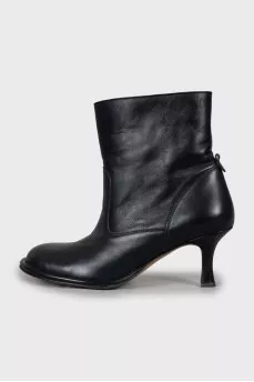 Black ankle boots with a figured heel