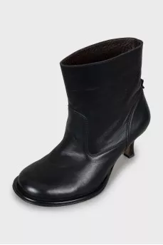 Black ankle boots with a figured heel