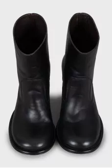 Black ankle boots with a figured heel