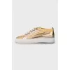 Gold leather sneakers