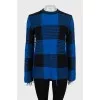 Checkered sweater with seams on the outside