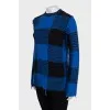 Checkered sweater with seams on the outside