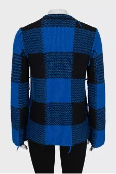 Checkered sweater with seams on the outside
