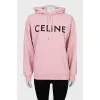 Pink oversized hoodie with black logo