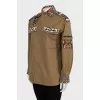 Khaki jacket decorated with beads