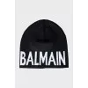 Black and white hat with brand logo