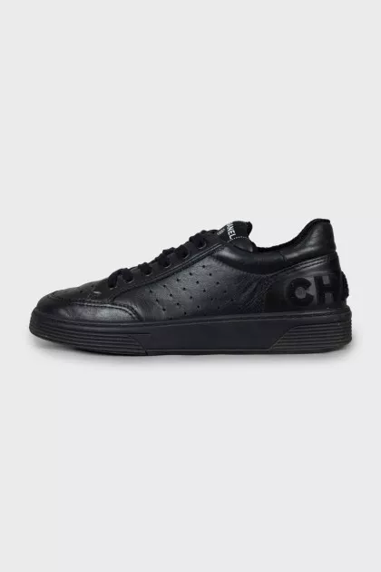 Leather sneakers with embossed logo