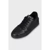 Leather sneakers with embossed logo