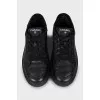 Leather sneakers with embossed logo