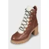 Insulated ankle boots with tag