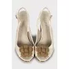 Sandals with metal heel decoration