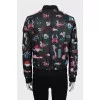 Leather bomber jacket decorated with embroidery
