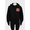 Cropped hoodie with embossed print