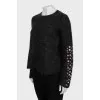 Loose sweater with embroidery on the sleeves