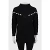 Textured sweater decorated with rhinestones