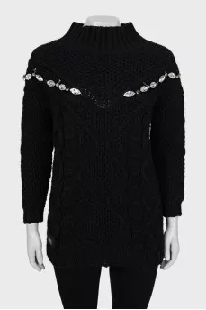 Textured sweater decorated with rhinestones