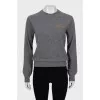 Wool sweater with embroidered logo