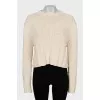 Cropped sweater with a cutout on the back
