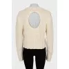 Cropped sweater with a cutout on the back