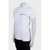 White T-shirt decorated with lightning