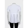 White T-shirt decorated with lightning
