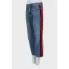 Tapered jeans with stripes