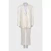 White suit with flared trousers