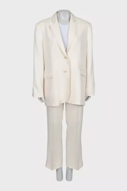 White suit with flared trousers