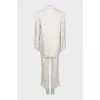 White suit with flared trousers
