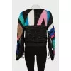 Knitted sweater with slits on the sleeves