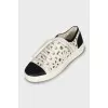 Sneakers with perforated leather