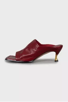 Leather sandals with golden stiletto heels
