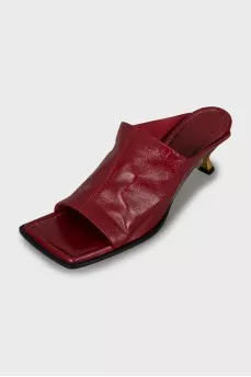 Leather sandals with golden stiletto heels