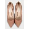 Patent leather shoes with metal heels