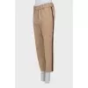 Tapered trousers with stripes