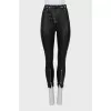 Leather trousers with silver buttons