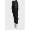 Leather trousers with silver buttons