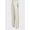 Men's trousers with stitched creases