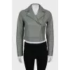 Cropped green leather jacket