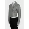 Cropped green leather jacket