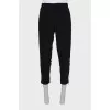 Men's trousers with stitched creases