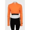 Orange top with embroidered logo