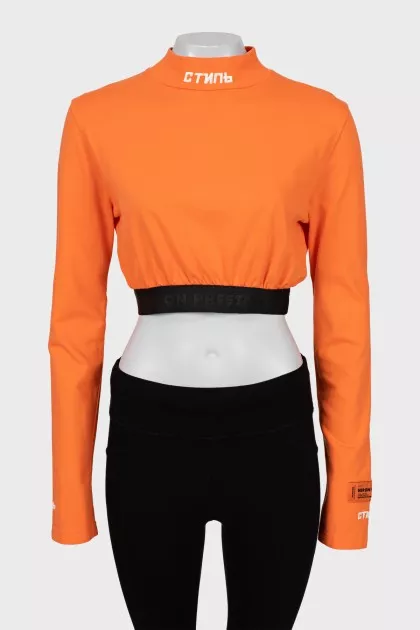 Orange top with embroidered logo