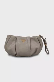 Leather clutch with gold logo