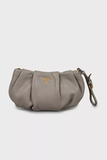 Leather clutch with gold logo