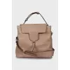 Leather crossbody bag with embossed logo