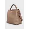 Leather crossbody bag with embossed logo