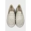 Men's white loafers with embossed leather