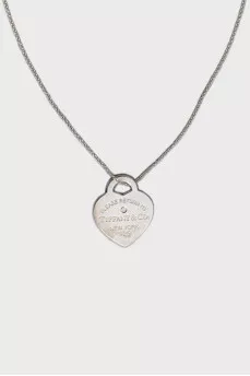 Silver pendant with round diamond